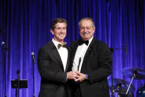 Alex Gorsky, Chairman of the Board and CEO of Johnson & Johnson, is honored with the Prometheus Award, by Andrew N. Liveris, The Hellenic Initiative Chairman.